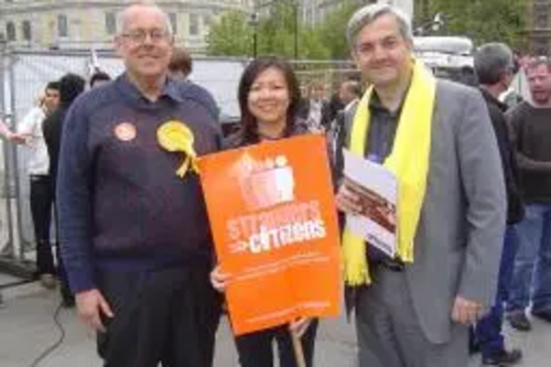 Chris Huhne, Merlene Emerson and Jonathan Fryer at Strangers into Citizens rally 4 May 2009